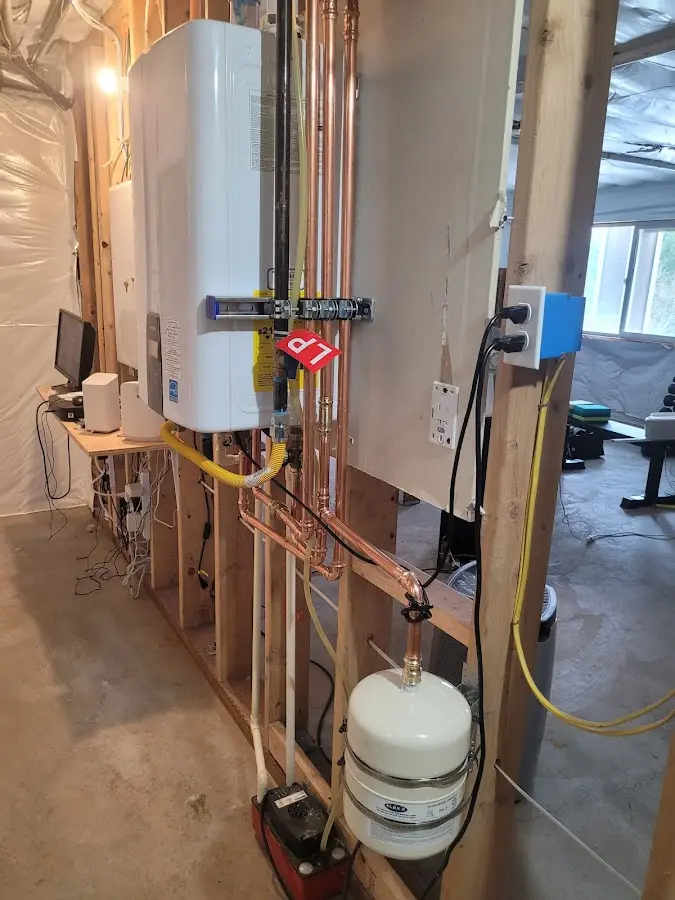 Licensed plumber repairing a kitchen sink in Newark